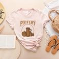 A Day Without Pottery Teacher Clay Kiln Ceramics Artist Men Women Women's Heather T-Shirt Heather Peach