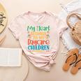 Daycare Children Childcare Provider Teacher PreK Nursery Women's Heather T-Shirt Heather Peach