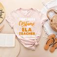 I Don't Need A Costume I'm A ELA Teacher Halloween Women's Heather T-Shirt Heather Peach
