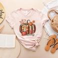 Fall Book Pumpkin Retro Reading Halloween Teacher Women's Heather T-Shirt Heather Peach Fall Book Pumpkin Retro Reading Halloween Teacher Women's Heather T-Shirt Heather Peach