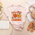 Fall In Love With Learning Thanksgiving Teacher Student Kids Women's Heather T-Shirt Heather Peach