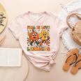Fall In Love With Learning Thanksgiving Teacher Student Women's Heather T-Shirt Heather Peach