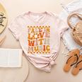 Fall In Love With Music Groovy Thanksgiving Music Teacher Men Women Girls Kids Women's Heather T-Shirt Heather Peach