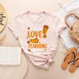 Fall In Love With Teaching 1st Grade Teacher Thanksgiving For Men Women Girls Kids Women's Heather T-Shirt Heather Peach Fall In Love With Teaching 1st Grade Teacher Thanksgiving For Men Women Girls Kids Women's Heather T-Shirt Heather Peach