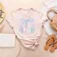 First Grade Coquette Bow Girls Teacher Team 1st Grade Squad Women's Heather T-Shirt Heather Peach
