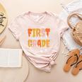 First Grade Dream Retro Team Fall Halloween Spooky Teachers Women's Heather T-Shirt Heather Peach First Grade Dream Retro Team Fall Halloween Spooky Teachers Women's Heather T-Shirt Heather Peach