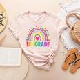 First Grade Rainbow Girls Boys Teacher Team 1st Grade Squad Women's Heather T-Shirt Heather Peach