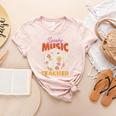 Groovy Faboolous Spooky Music Teacher Halloween Men Women Women's Heather T-Shirt Heather Peach