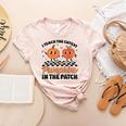 Groovy I Teach The Cutest Pumpkins In The Patch For Teacher Women's Heather T-Shirt Heather Peach