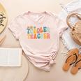 Groovy Toddler Teacher Appreciation Back To School Women's Heather T-Shirt Heather Peach Groovy Toddler Teacher Appreciation Back To School Women's Heather T-Shirt Heather Peach
