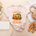 Halloween Teacher Librarian Pumpkin Reading Books Men Women Kids Women's Heather T-Shirt Heather Peach