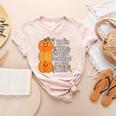 Halloween Teacher Shirt I Teach The Cutest Pumpkins In Patch Men Women Kids Women's Heather T-Shirt Heather Peach