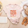 Having a Weird Music Teacher Builds Character Music Teacher Women's Heather T-Shirt Heather Peach