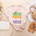 Hocus Pocus Everybody Focus Teacher Halloween Women's Heather T-Shirt Heather Peach