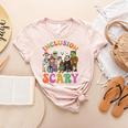 Inclusion Isnt Scary Halloween Skeleton Ghost Sped Teacher Women's Heather T-Shirt Heather Peach Inclusion Isnt Scary Halloween Skeleton Ghost Sped Teacher Women's Heather T-Shirt Heather Peach
