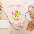 Kindergarten ABCD Rocks Teacher Student Back To School Women's Heather T-Shirt Heather Peach Kindergarten ABCD Rocks Teacher Student Back To School Women's Heather T-Shirt Heather Peach
