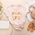 Kindergarten Dream Ghost Team Fall Halloween Spooky Teachers Women's Heather T-Shirt Heather Peach