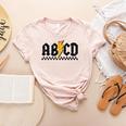 Lightning Pencil Rock'n Roll ABCD Teacher Back To School Kid Women's Heather T-Shirt Heather Peach Lightning Pencil Rock'n Roll ABCD Teacher Back To School Kid Women's Heather T-Shirt Heather Peach
