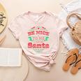 Be Nice To Me I Know Santa Teacher Christmas Men Women Women's Heather T-Shirt Heather Peach Be Nice To Me I Know Santa Teacher Christmas Men Women Women's Heather T-Shirt Heather Peach