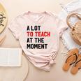 Quote A Lot To Teach At The Moment Teacher Women Women's Heather T-Shirt Heather Peach