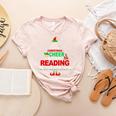Reading Teacher Christmas Shirt Elf Christmas Cheer For Men Women Women's Heather T-Shirt Heather Peach