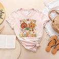 Retro Fall In Love With Learning Autumn Pumpkin Teacher Kids Women's Heather T-Shirt Heather Peach