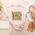 Santas Favorite Teacher Retro Groovy Christmas Xmas Women Women's Heather T-Shirt Heather Peach Santas Favorite Teacher Retro Groovy Christmas Xmas Women Women's Heather T-Shirt Heather Peach