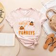 I Teach The Cutest Little Turkeys For Teacher Thanksgiving Women's Heather T-Shirt Heather Peach I Teach The Cutest Little Turkeys For Teacher Thanksgiving Women's Heather T-Shirt Heather Peach