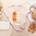 I Teach The Cutest Pumpkins In Patch Pre-K Halloween Teacher Women's Heather T-Shirt Heather Peach