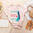 Teacher Dinosaurs Didnt Read Look What Happened Book Reading Women's Heather T-Shirt Heather Peach Teacher Dinosaurs Didnt Read Look What Happened Book Reading Women's Heather T-Shirt Heather Peach