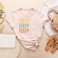 Teacher Kindness Compassion Confidence Teaching Women's Heather T-Shirt Heather Peach Teacher Kindness Compassion Confidence Teaching Women's Heather T-Shirt Heather Peach