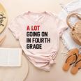 Teacher A Lot Going On In Fourth Grade Back To School Women's Heather T-Shirt Heather Peach