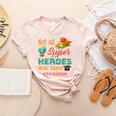 Teacher Not All Superheroes Wear Capes Teacher Squad Women's Heather T-Shirt Heather Peach Teacher Not All Superheroes Wear Capes Teacher Squad Women's Heather T-Shirt Heather Peach