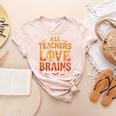 All Teachers Love Brains Shirt Halloween Teacher Women's Heather T-Shirt Heather Peach