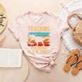 Teaching Is a Walk In Park Dinosaur Teacher Women's Heather T-Shirt Heather Peach