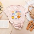 Trick Or Teach Cute Halloween Teacher Women's Heather T-Shirt Heather Peach