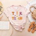 Trick Or Teach Teacher Halloween Costume Men Women Women's Heather T-Shirt Heather Peach