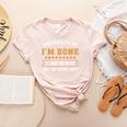 University Of I'm Done Teacher Retirement 2025 Women's Heather T-Shirt Heather Peach