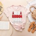 We Wear Red For Red Ribbon Week Awareness Mothers Teachers Women's Heather T-Shirt Heather Peach We Wear Red For Red Ribbon Week Awareness Mothers Teachers Women's Heather T-Shirt Heather Peach