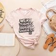 Weird Teachers Build Character School Pun Women's Heather T-Shirt Heather Peach