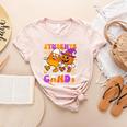 Will Trade Students For Candy Teacher Halloween Women's Heather T-Shirt Heather Peach