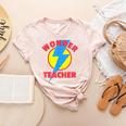 Wonder Teacher Teacher Halloween Tshirt Women's Heather T-Shirt Heather Peach