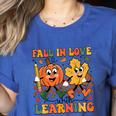 Fall In Love With Learning Thanksgiving Teacher Student Women's Heather T-Shirt Heather True Royal