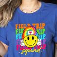 Field Trip Squad Groovy Field Day Smile Face Teacher Tie Dye Women's Heather T-Shirt Heather True Royal