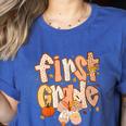 First Grade Fall Floral Coquette Bow Teachers Students Women's Heather T-Shirt Heather True Royal First Grade Fall Floral Coquette Bow Teachers Students Women's Heather T-Shirt Heather True Royal