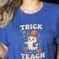 Halloween Teacher Shirts Women School Trick Or Teach Groovy Women's Heather T-Shirt Heather True Royal
