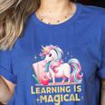 LEARNING IS MAGICAL TEACHER UNICORN BACK TO SCHOOL UNICORN Women's Heather T-Shirt Heather True Royal