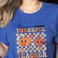 One Thankful Teacher Thanksgiving Groovy Fall Autumn Teacher Women's Heather T-Shirt Heather True Royal One Thankful Teacher Thanksgiving Groovy Fall Autumn Teacher Women's Heather T-Shirt Heather True Royal