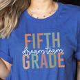 Retro Fifth Grade Dream Team Groovy Teacher Back To School Men Women Girls Kids Women's Heather T-Shirt Heather True Royal Retro Fifth Grade Dream Team Groovy Teacher Back To School Men Women Girls Kids Women's Heather T-Shirt Heather True Royal