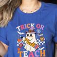 Retro Floral Ghost Trick Or Teach Groovy Teacher Halloween Women's Heather T-Shirt Heather True Royal